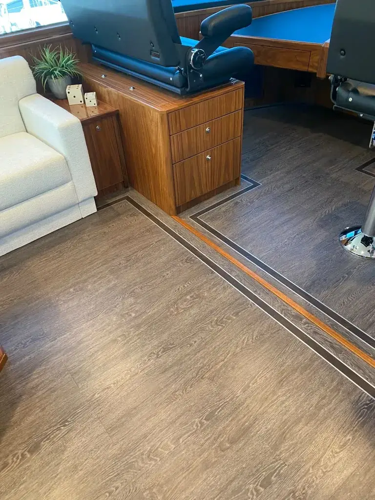 Amtico flooring around helm and cabinetry