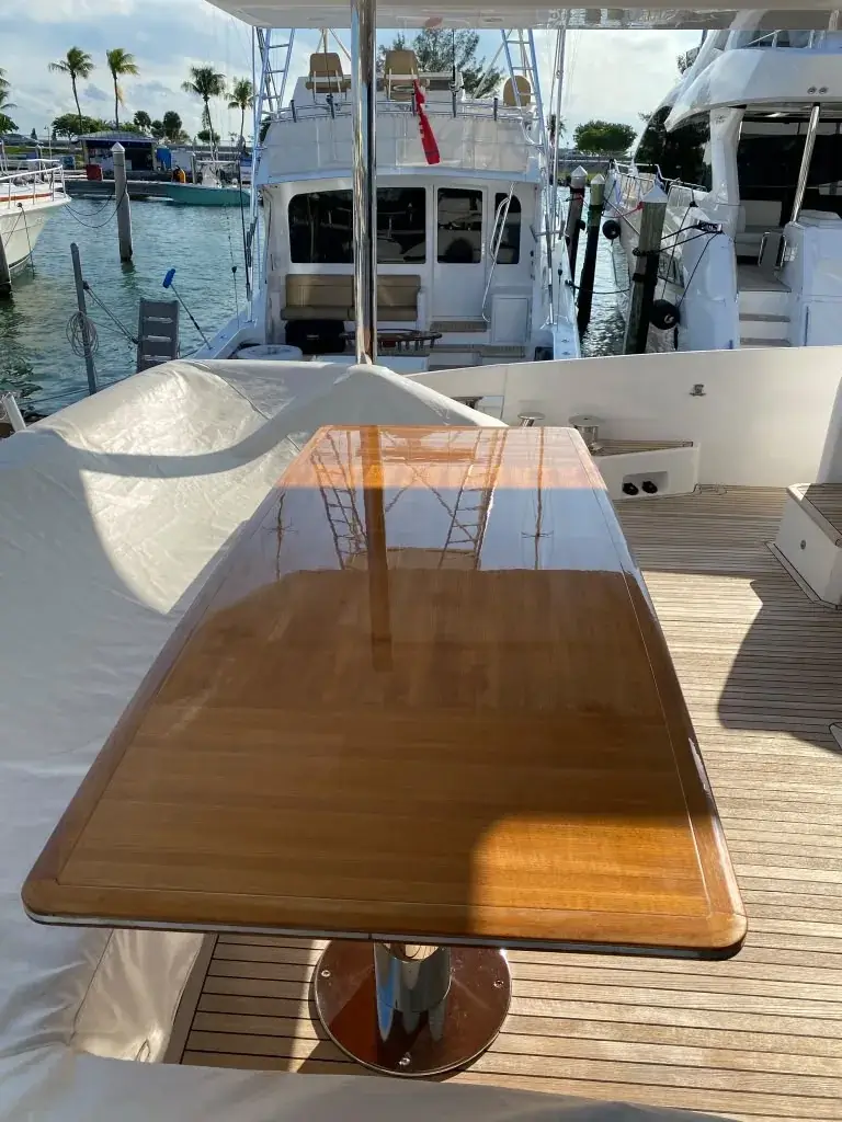 High-gloss custom marine table installed on an aft deck
